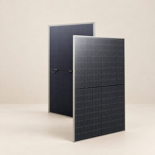 Front and rear views of solar panels on a warm ivory studio background
